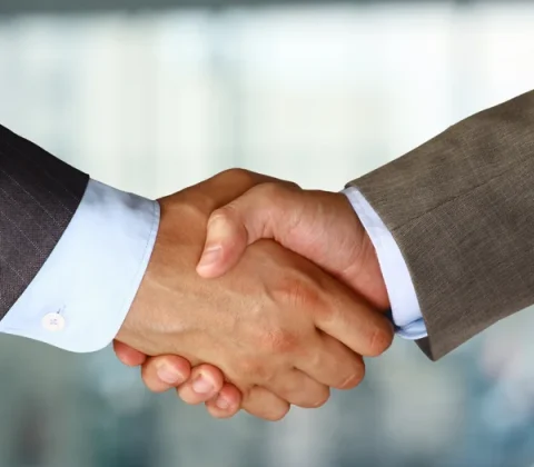 depositphotos_12388558-stock-photo-closeup-of-a-business-hand